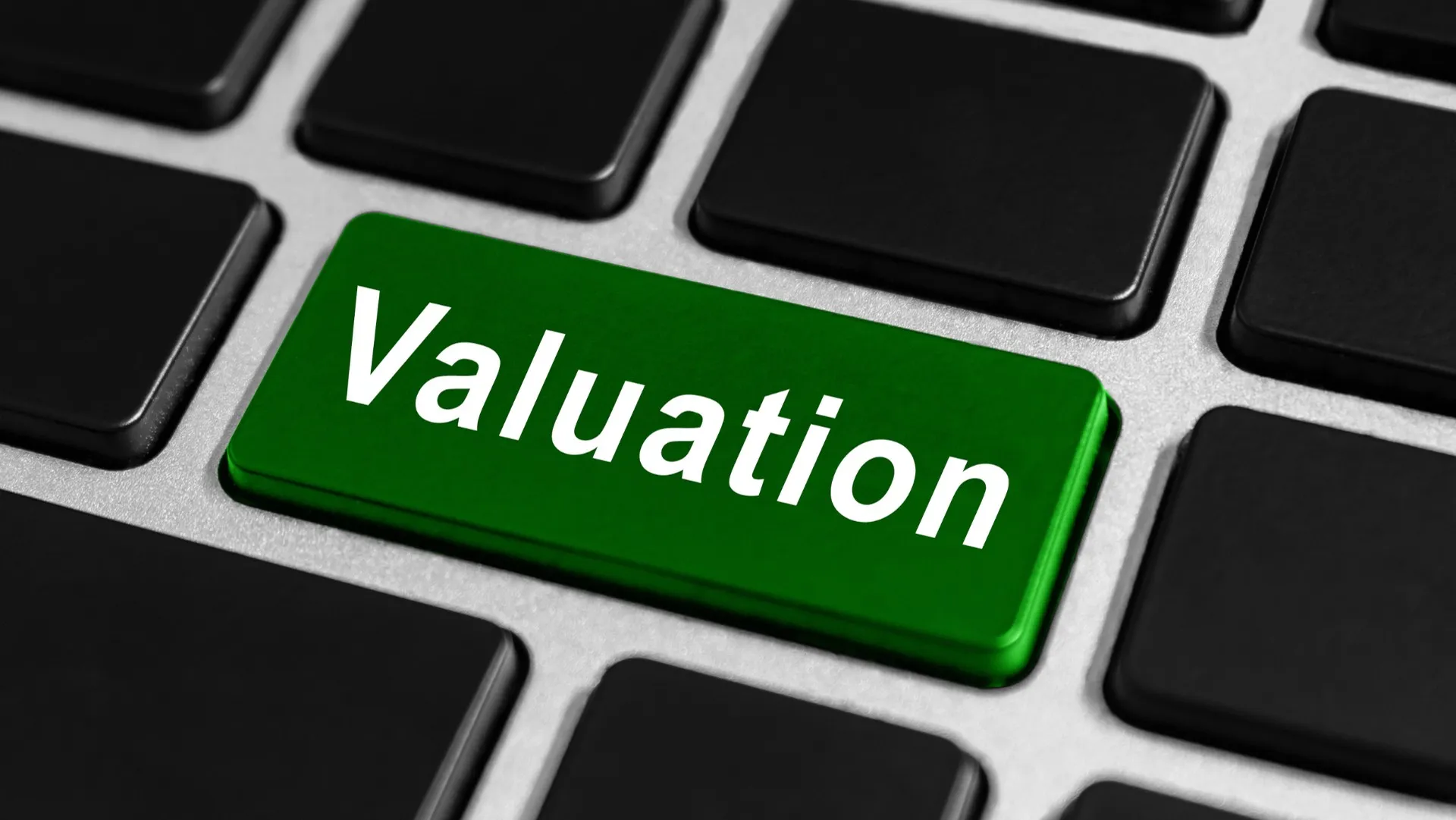 Touche de clavier avec l'inscription "valuation"