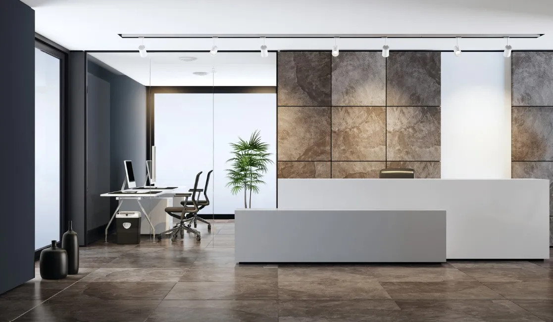 Un hall de r&eacute;ception de bureau moderne avec un espace de travail